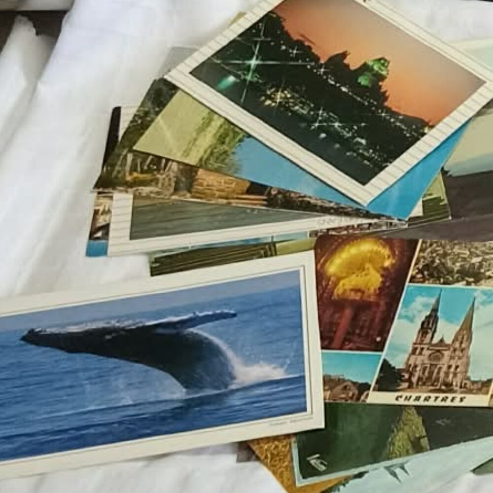 Collection of vintage postcards, some of which are very old